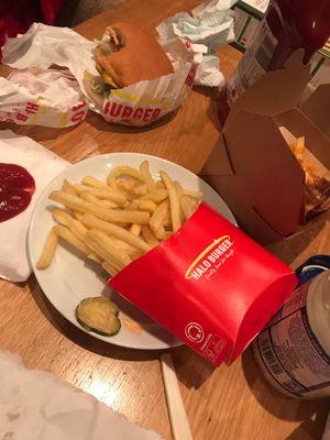 The pink salt fries, the cheese burger and unwanted pickle. at Halo Burger in South West London