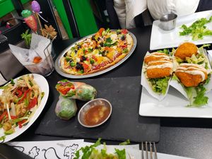 Dynamite calamushrooms, fresh rolls, buffalo cauliflower tacos, veggie pizza, and sweet potato tots! at Vegan Plate in Roseville