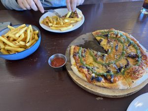 Pizza and fries   at Sprig & Fern in Christchurch