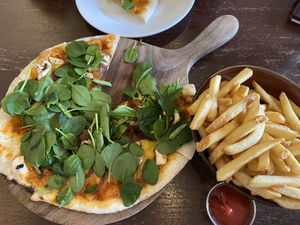 Mushroom, spinach and caramelised onion pizza and fries   at Sprig & Fern in Christchurch