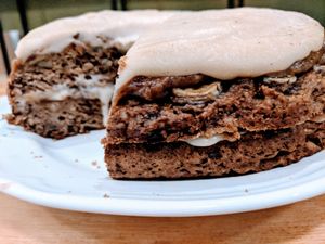 Spelt Banoffee Cake with Date & Peanut Butter Caramel and Cashew Frosting  at La Sociedad Herbivora in Malaga