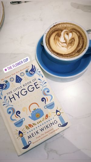 Reading my favourite book at my favourite café.  at The Flower Cup in Chester