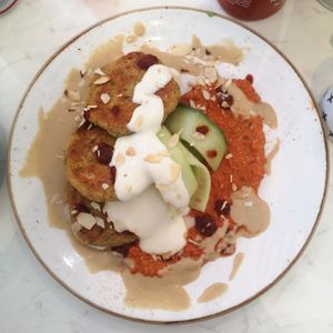 Chickpea falafel, spicy harrissa, pickled cucumber, yogurt, tahini and almonds at The Flower Cup in Chester