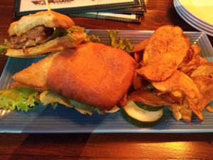 Vegan burger with chips at Bit Bar in Salem