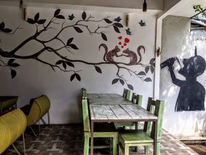 Cool murals downstairs at The Cup Resto in Abang