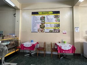 Inside. The menu on the wall is Thai, but works with Google translate. One person working here speaks English, and they also have a menu behind the counter translated to English.  at Raan J Koh in Loei
