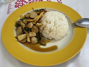 Fried basil with vegan pork sausage, squid and salted fish.  at Raan J Koh in Loei