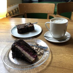 Forest cake with marzipan (vegan - excellent!) 🍰, forest cake with dried fruits (vegan - don’t recommend!), latte with soy milk  at Poslasticarnica Suma in Belgrade
