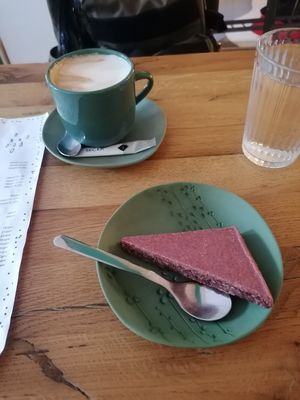 Strawberry cookie and coffee with oat milk at Poslasticarnica Suma in Belgrade