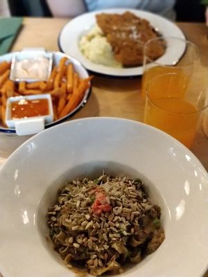 Pasta, sweet potato fries and the soy steak at Veganda in Warsaw