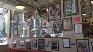 Pictures of stars and old magazine covers at Bagelstein in Geneva