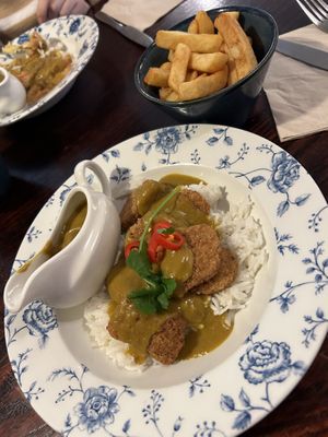 Vegan Quorn Nugget Curry Katsu with extra curry sauce and a side of chips.   at The Admiral Byng in Potters Bar