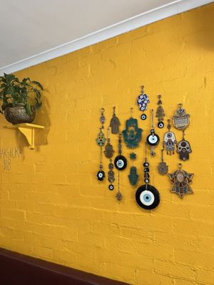 Evil eye wall decoration   at Za'atar in Bellingen