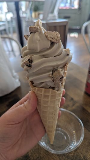 Vanilla soft serve in a waffle cone with cookie dough chunks at VegOut in Bethlehem