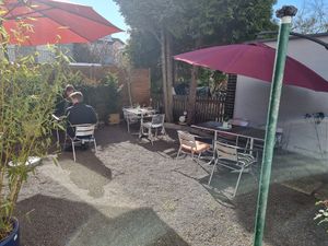 Outdoor seating at the back at Vegan Village in Hannover