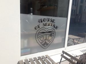 Window logo at House of Seitan in Gdansk
