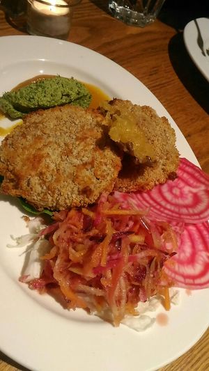 Risotto cakes and rainbow slaw at Inner Light Kitchen in Halifax