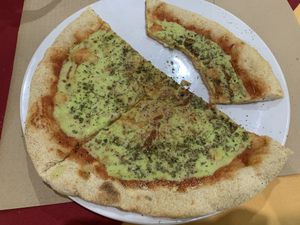 Vegan pizza with zucchini cheese at Govindas in Tenerife