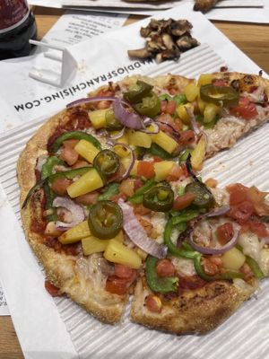 My pizza after I took toppings from my husbands. They accidentally added mushrooms which I don’t like but not a big deal!   at ATL - Uncle Maddio's - TT in College Park