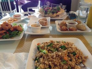 Starting at 12 o'clock:
The Taco Bowl (it was a Mother's Day special)

Spring Rolls

Pan-fried dumplings & Crispy Wontons

Guru Fried Rice (I substitute broccoli for the peas) 

Spicy Cha Cha (it's like flavorfully spiced fried shrimp)

fr at Loving Hut in Phoenix