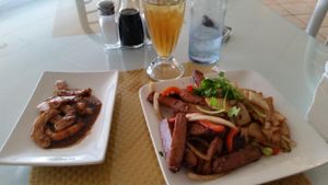 steak and potatoes with a side of yam shrimp at Loving Hut in Phoenix