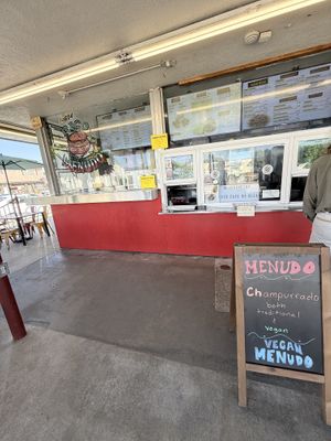 Sign in front advertising vegan menudo   at Garduno's Taco King in Baldwin Park