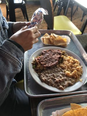 tofu scramble topped with jackfruit and rice & beans  at Garduno's Taco King in Baldwin Park
