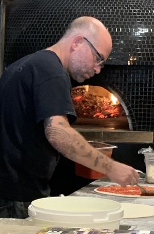 Wood fired pizza being made to order  at The Mill on Main in Huntsville