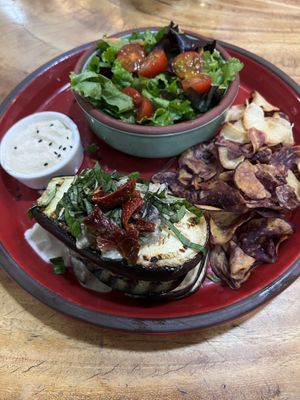 Eggplant lasagna with salad and hummus and veggie chips  at Camellias Tea in Guayaquil