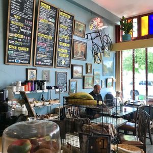 local artwork on walls and plenty of seating at Just Bob in Portland