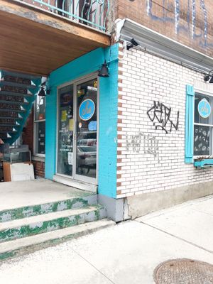 Outside at CHE Churros & Empanadas  in Montreal