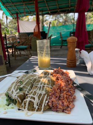 Spinach buckwheat crepe with carrot coleslaw.  Spinach filling included garlic so ask for it without if you are sensitive.   at Vegan Casa in Patnem