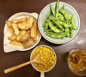 Fried potatoes, grilled corn, edamamee  at Ren in Kutchan