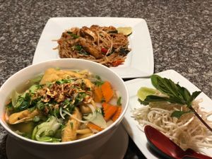 Vegan pad Thai w/ tofu (just need to ask for no egg) + vegan pho at The Boiling Bowl in Portland