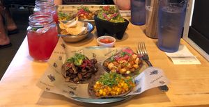 Grilled mushroom, crispy potatoes, elote tacos, watermelon agua fresca, & guac at Nixtaco in Roseville