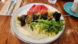 Mushroom skewer with pearl couscous and tahini sauce at Naim  in Paddington