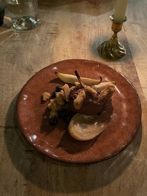 Chocolate mousse with baked pear and peanut brittle at The Meets Restaurant in Amsterdam