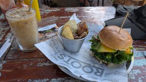 Vegan burger (hummus and beetroot), decaf oat frappachino at Roots in San Pedro De Atacama