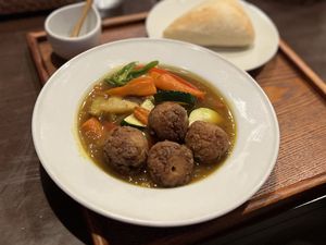 Veg meatballs in curry broth with fresh bread  at Jinenya - Karuizawa Bypass in Nagano