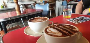 Almond milk (closer to the camera) and soy cappuccino at Feedback Cafe in Yarraville