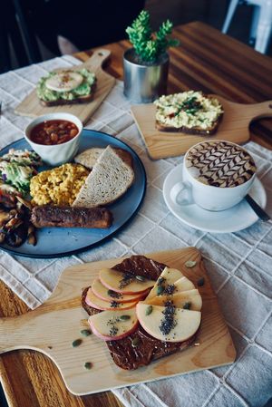 English breakfast, sourdough toast and soy-milk based coffee. at Pando Cafe in Kota Kinabalu