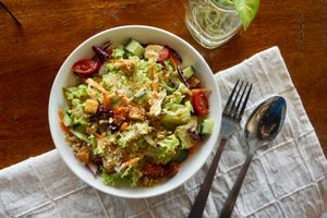 Caesar salad with house-made dairy free Parmesan cheese at Pando Cafe in Kota Kinabalu