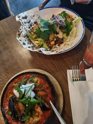 Vegan Shakshuka and planted chicken shawarma at Grand Café Lochergut in Zurich