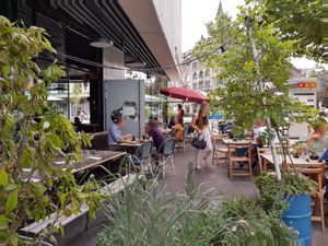 Seating on the side away from road at Grand Café Lochergut in Zurich