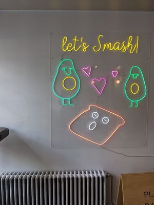 Avocado neon at Root in Newport