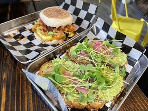 avocado toast + breakfast sandwich  at Root in Newport