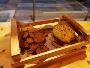 With breaded eggplant as a side at Flower Burger in Bari