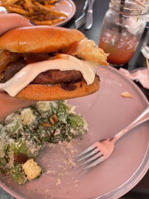 Mozza melt burger with side Caesar salad at Nateure's Plate in Peterborough