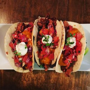 “Beef” tacos with their own ground substitute, Pico de Gallo, lettuce, quest cheese, and sour cream at Nateure's Plate in Peterborough