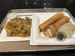 Side of biryani and buffalo dosa wrap  at Art of Dosa in Chicago